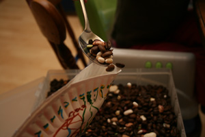 toddler making shaker craft